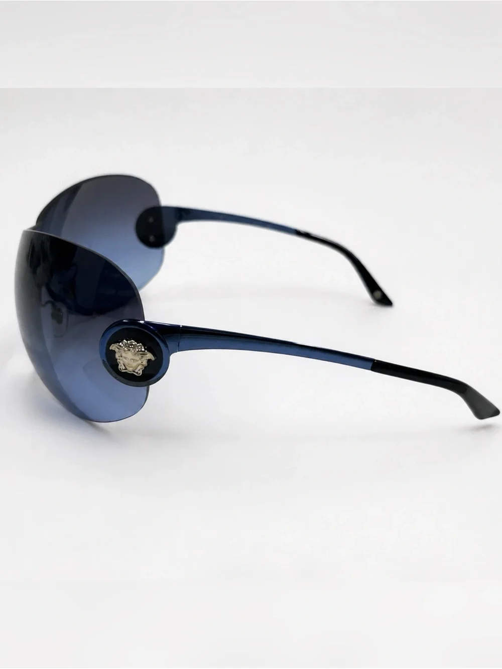 Vintage Versace Blue Rimless Shield Sunglasses in Deep Blue Y2K 2113